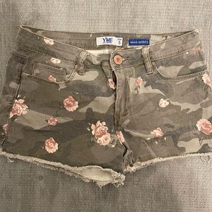 YMI Size 5 Mid rise Flower shorts.